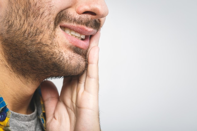 Photo young handsome man having a toothache