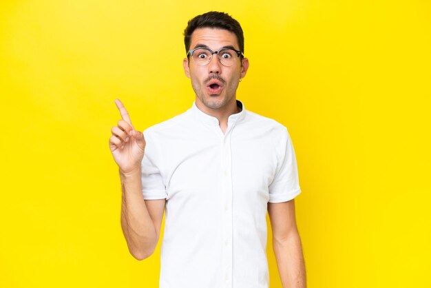 Young handsome man over isolated background