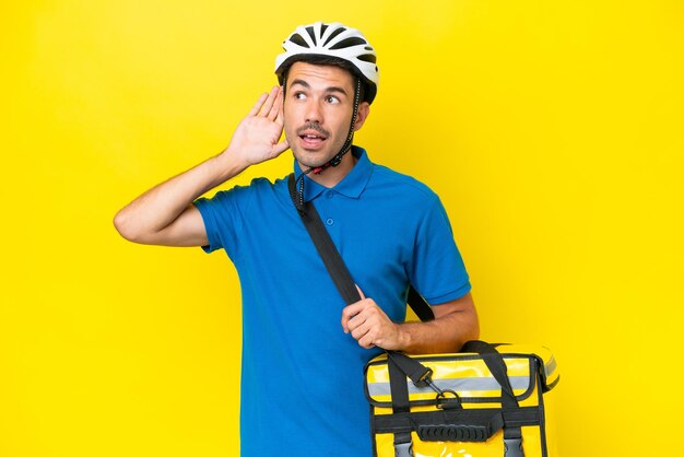 Young handsome man over isolated background