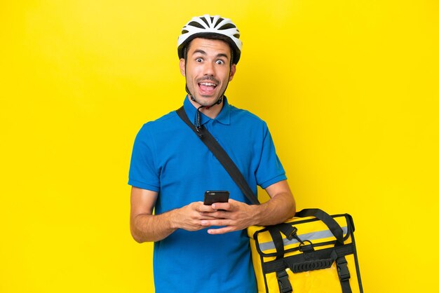 Young handsome man over isolated background