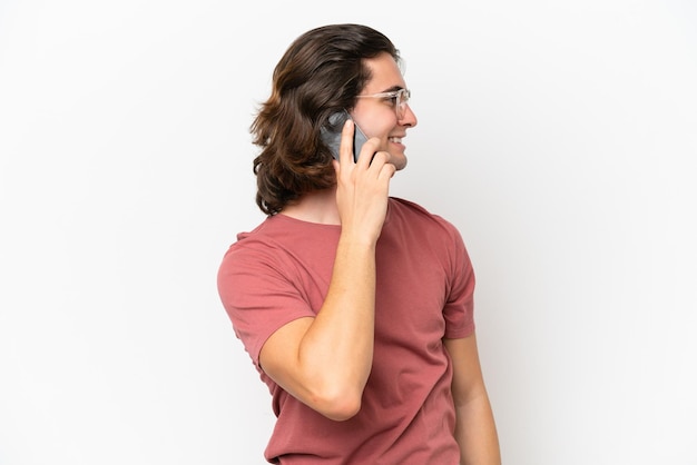 Young handsome man over isolated background