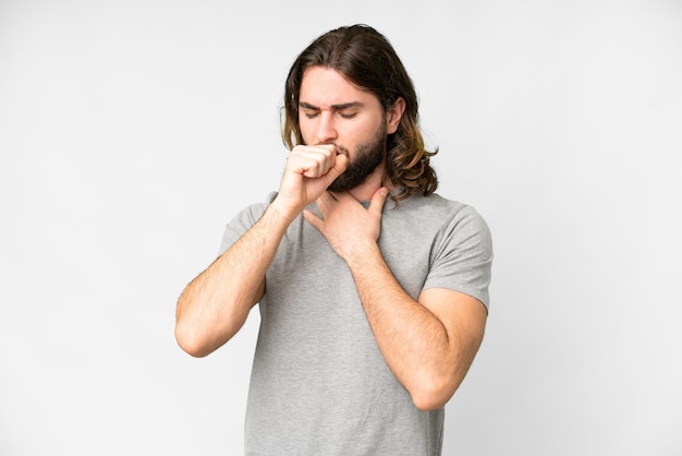Young handsome man over isolated white background coughing a lot
