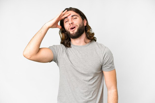 Young handsome man over isolated white background has realized something and intending the solution