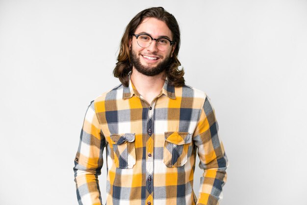 Young handsome man over isolated white background laughing