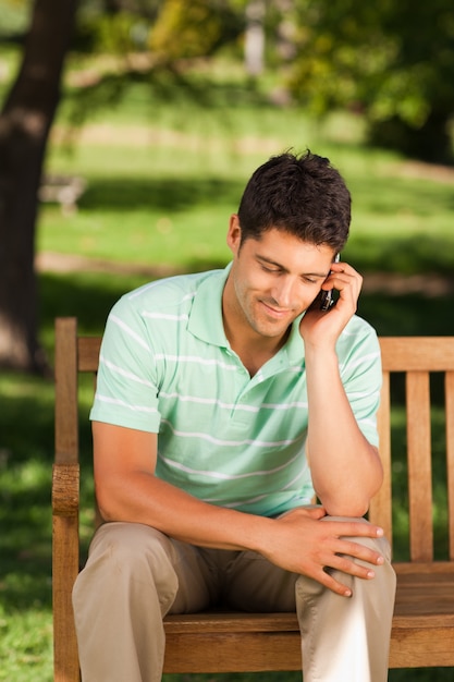 Young handsome man phoning 