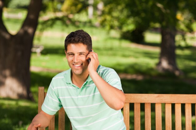 Young handsome man phoning 