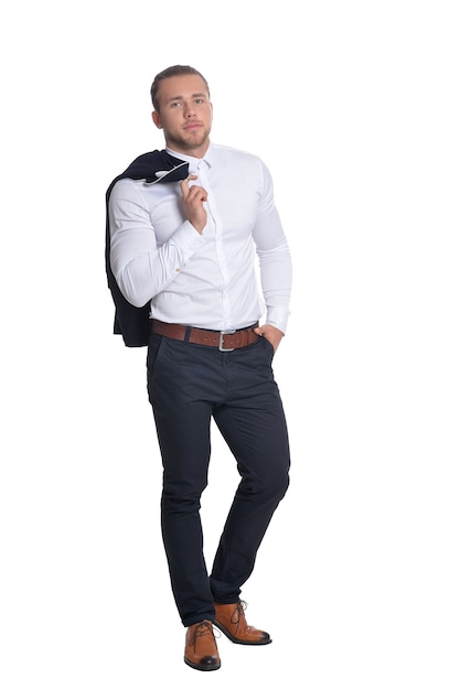 Young handsome man posing in formal clothes