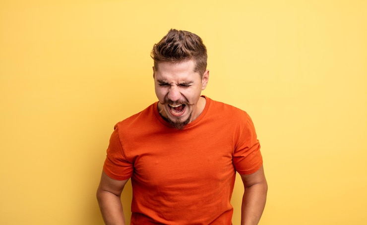 Photo young handsome man shouting aggressively, looking very angry, frustrated, outraged or annoyed, screaming no. strange moustache concept
