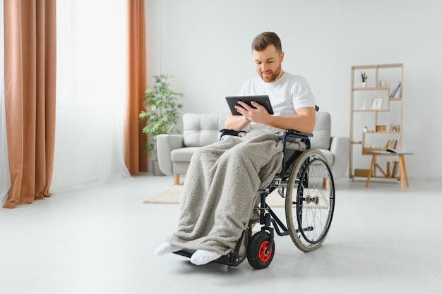 Young handsome man in wheelchair