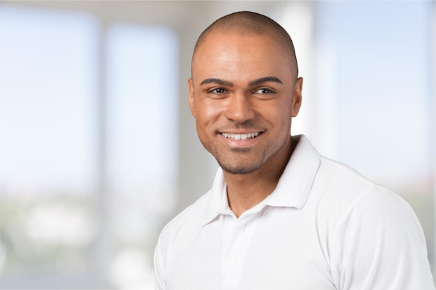 Young handsome man in white shirt