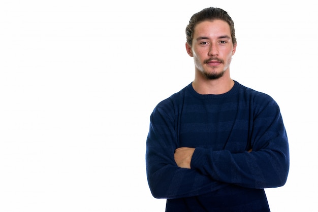 Young handsome man with arms crossed isolated