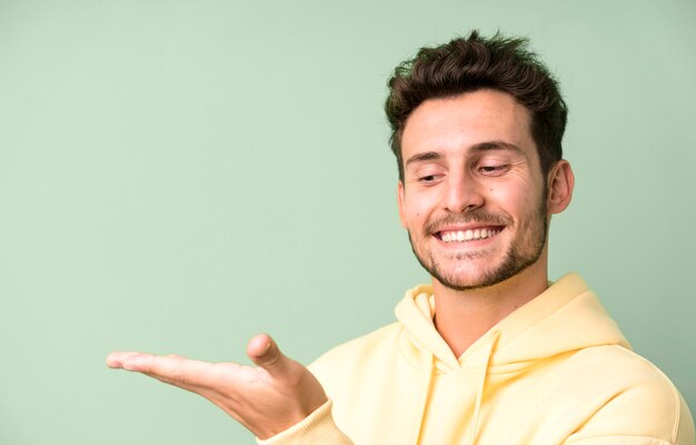 Young handsome man with a copy space to the side