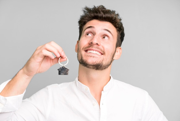young handsome man with his first car key
