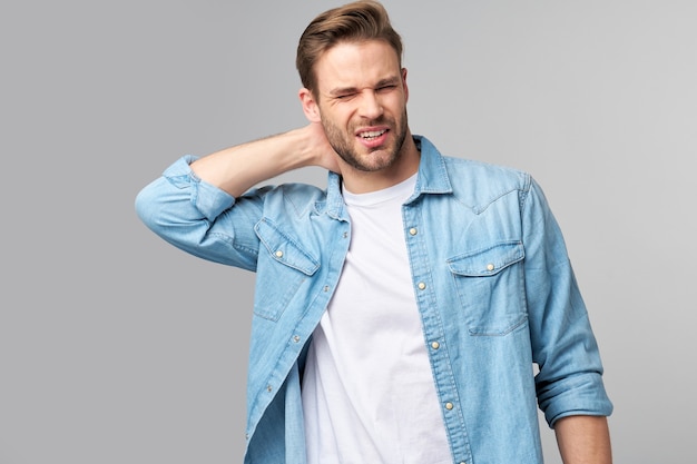 Young handsome man with neck paint standing  