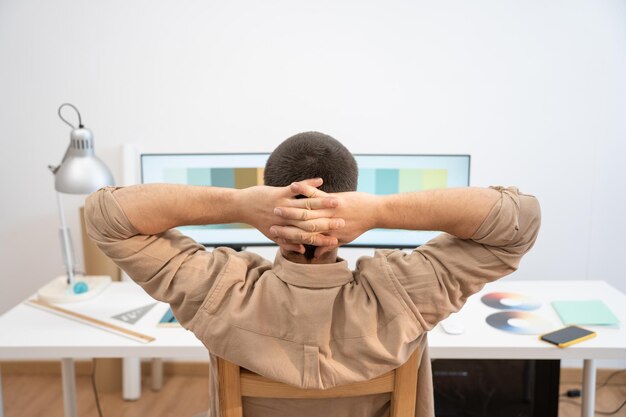 Young Handsome Man Working from Home on Desktop Computer Creative Designer relaxed in his work set