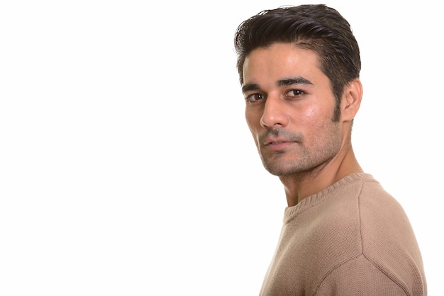 Young handsome Persian man on white