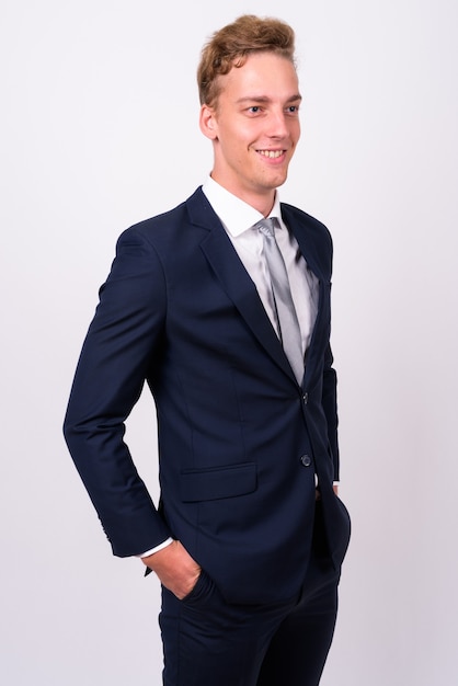 young handsome Scandinavian businessman with curly blond hair
