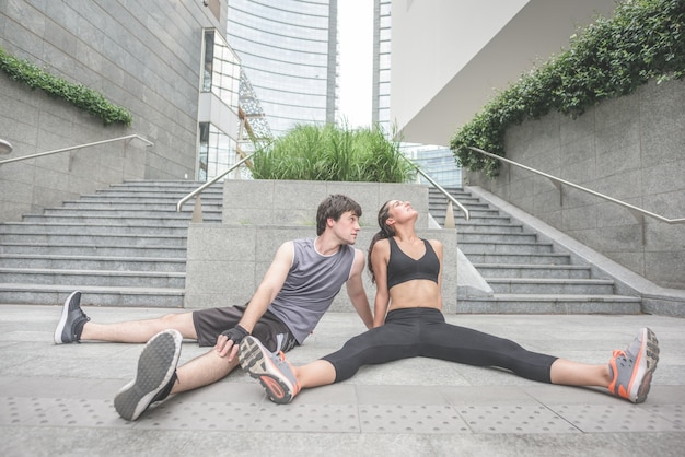 young handsome sportive man and woman