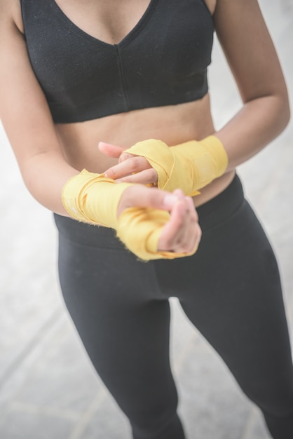 young handsome sportive woman boxer