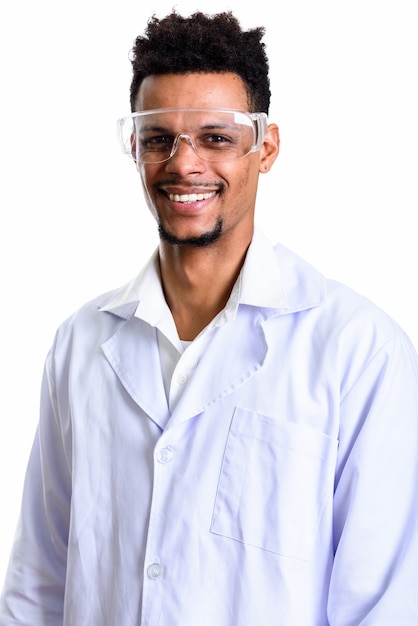 young happy African man doctor smiling while wearing protective glasses