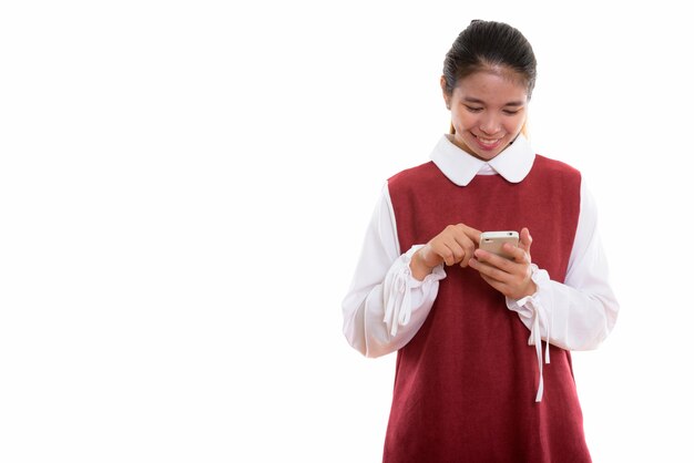 young happy Asian woman using phone