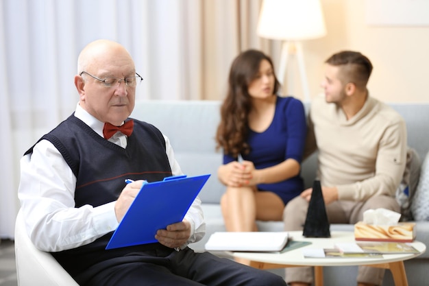 Young happy couple after therapy session with family psychologist