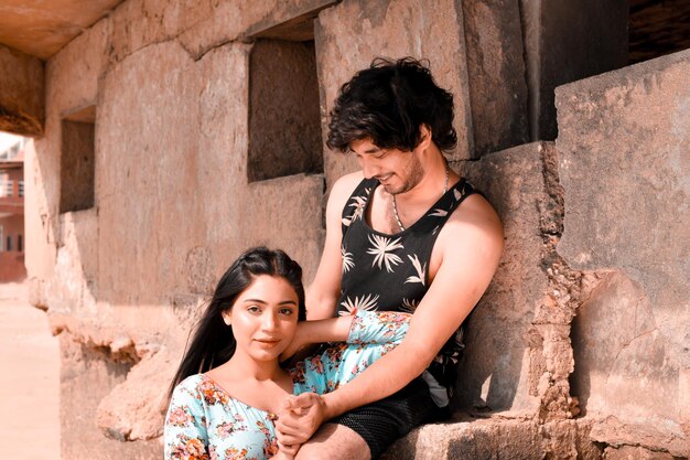 young happy couple at beach indian pakistani model