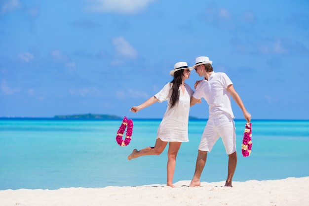 Young happy couple during beach tropical vacation