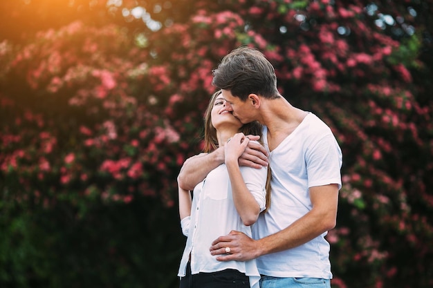 Young happy couple in love outdoors