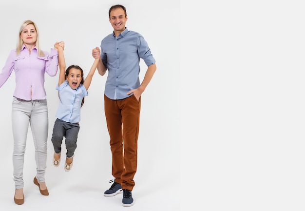 young happy family having fun on white background