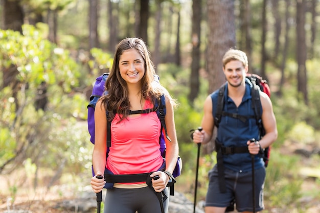 Young happy joggers looking at camera