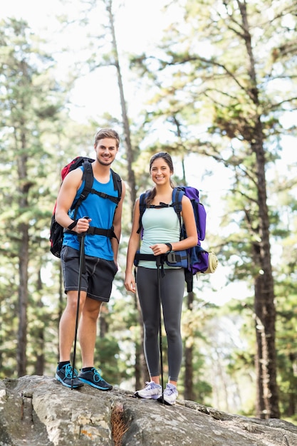 Young happy joggers looking at camera