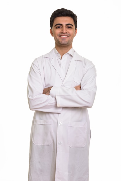 Young happy man doctor smiling with arms crossed