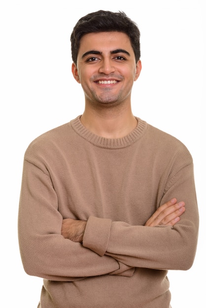 Young happy man smiling and looking at camera