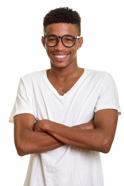 Young happy man smiling with arms crossed