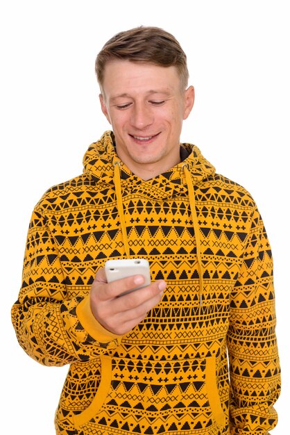 young happy man using mobile phone