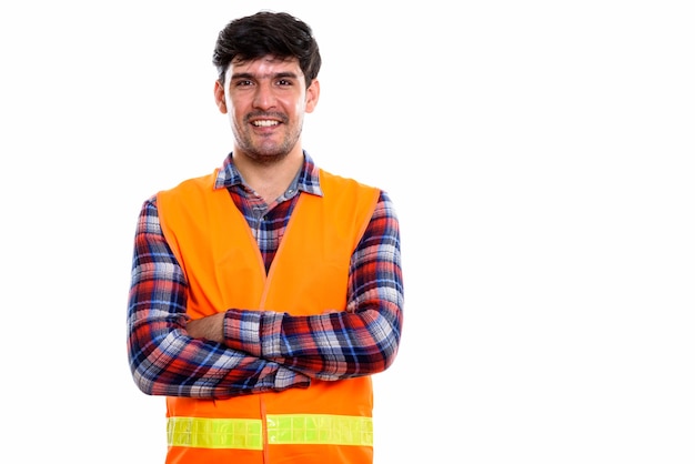 young happy Persian construction worker smiling