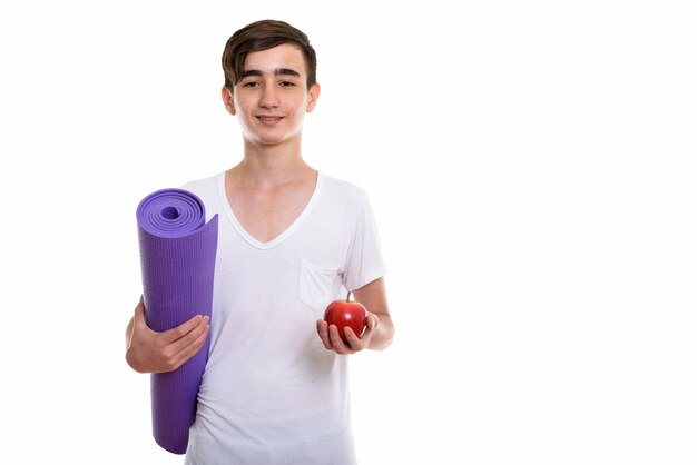 young happy Persian teenage boy smiling