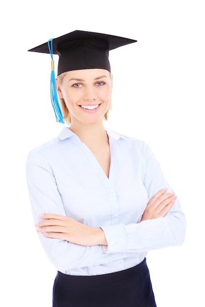 a young happy student posing over white background