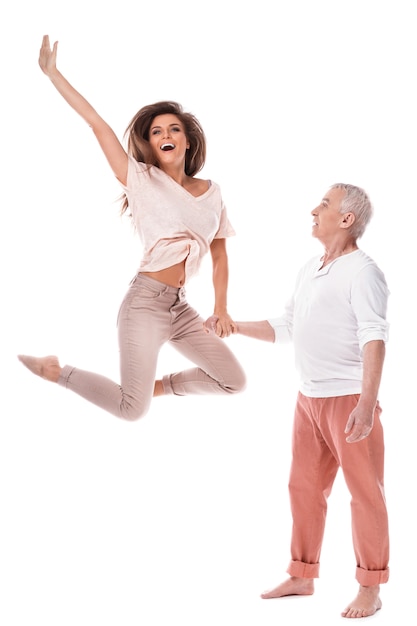 Photo young happy woman and her elderly father