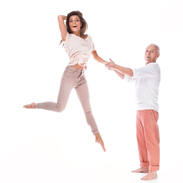 Young happy woman and her elderly father