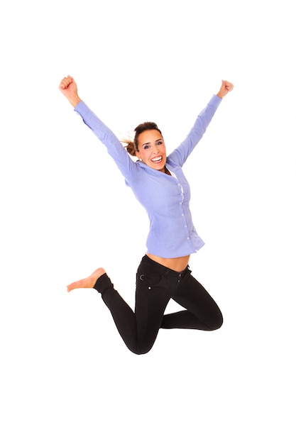 young happy woman jumping with joy over white background