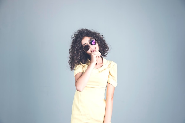 Young happy woman in studio