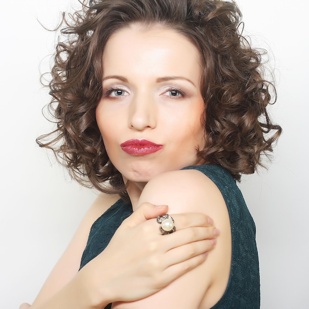 Young happy woman with curly hair