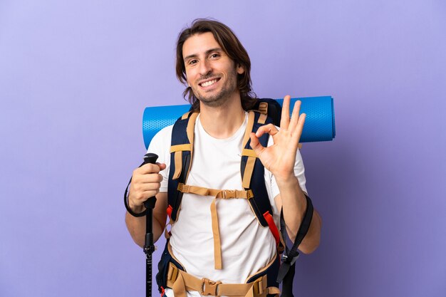 Young hiker man isolated