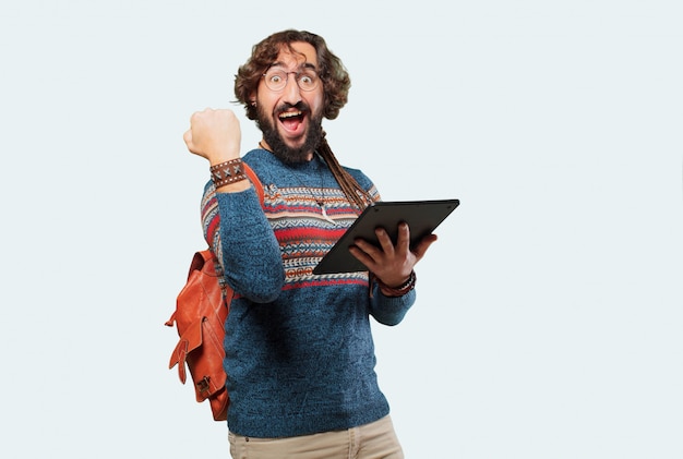 Young hippie man with a tablet