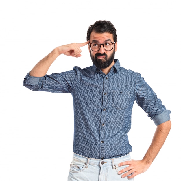 Young hipster man making crazy gesture