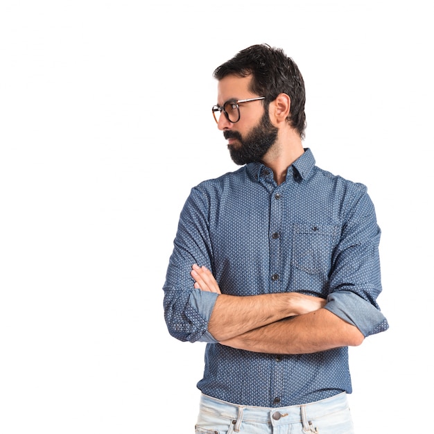 Young hipster man with his arms crossed