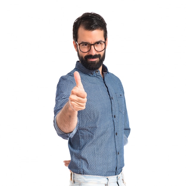 Young hipster man with thumb up