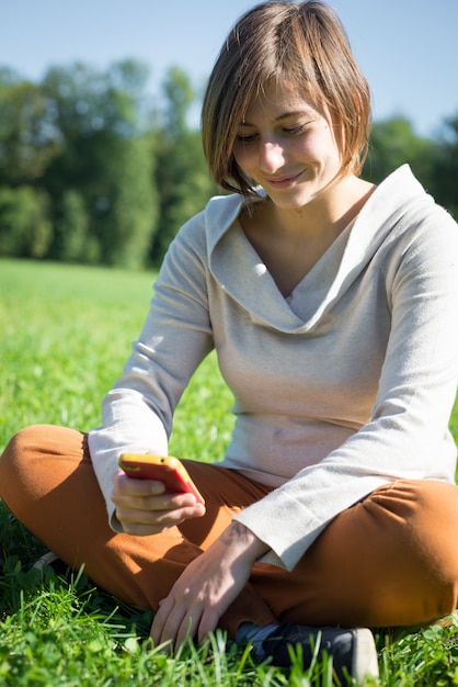 young hipster short hair woman on the phone